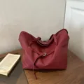 Minimalist red slouchy tote bag for women, soft leather casual shoulder handbag style. - Red