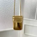 Gold metallic vertical phone crossbody bag, shiny mini shoulder bag variant for women. - Gold
