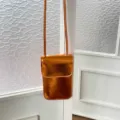 Metallic orange vertical mini crossbody phone bag stylish small shoulder bag for women - Orange