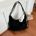 Black shoulder hobo bag for women, large capacity pleated dumpling bag with bow and plush bunny. - Black
