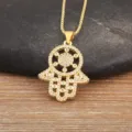 Exquisite gold plated hamsa hand necklace featuring sparkling cubic zirconia stones for women. - White Zirconia Hamsa Hand (N1265)