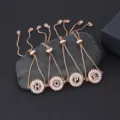 Rose gold adjustable initial letter bracelets set with shimmering micro-pave cubic zirconia stones. - Letter A / Rose Gold