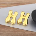 Gold puffy letter H earrings, minimalist smooth metal unisex fashion jewelry studs. - Letter H