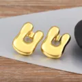 Gold-plated chunky bubble letter earrings, minimalist smooth metal unisex fashion jewelry. - Letter U
