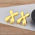 Gold puffy bubble stud earrings for women and men, chic smooth metal geometric ear jewelry. - Letter X