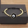 Bracelet mauvais oeil en cuivre plaque or avec perles noires et chaine reglable elegante - Noir