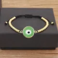 Bracelet dore Evil Eye avec pendentif vert perles metalliques et cordon reglable chic - Vert