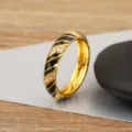 18K gold plated copper ring with black enamel spiral stripe and micro-set zirconia stones. - 6 / Black