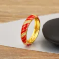 Gold plated copper ring with red enamel spiral stripe design and paved cubic zirconia crystals. - 6 / Red