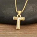 Gold-plated T-letter pendant necklace with natural mother-of-pearl and delicate beaded edge. - Letter T