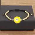 Bracelet mauvais œil en cuivre plaqué or 18k avec perle jaune et cordon noir réglable - Jaune