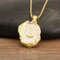 Gold plated initial letter U pendant necklace with white enamel irregular geometric design. - Letter U