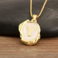 Gold plated 18k initial letter Y pendant necklace with irregular geometric white enamel design. - Letter Y