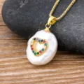Exquisite baroque pearl necklace featuring a colorful zircon heart pendant on gold chain. - Style 4