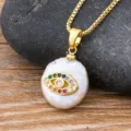 Evil eye baroque pearl pendant necklace with colorful cubic zirconia on gold chain. - Style 7