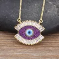 Trendy Turkish evil eye pendant necklace featuring purple and white stones, gold chain. - Purple