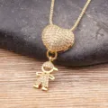Gold-plated heart pendant necklace with cute little boy charm, fashion clavicle chain. - 1 Boy, White
