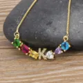 Gold plated letter K necklace with colorful cubic zirconia stones, elegant clavicle chain. - Letter K