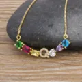 Gold plated letter Q necklace with colorful cubic zirconia gemstone pendant for daily wear. - Letter Q
