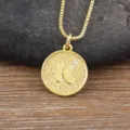 Gold plated initial K pendant necklace with sparkling cubic zirconia on rustic wood background. - Letter K