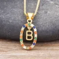Gold-plated letter B pendant necklace with colorful cubic zirconia stones and box chain. - Letter B