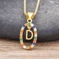Gold-plated initial letter D necklace with multi-colored cubic zirconia oval pendant for women. - Letter D
