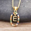 Gold letter E pendant necklace with colorful cubic zirconia stones for women daily wear. - Letter E