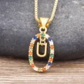Gold letter U pendant necklace featuring vibrant multi-color cubic zirconia stones for women. - Letter U