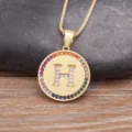 Gold plated copper round letter H pendant necklace with colorful cubic zirconia border. - Letter H