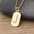 Minimalist gold letter J pendant necklace, copper plated 18k gold with cubic zirconia. - Letter J