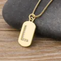 Gold initial letter L pendant necklace with sparkling cubic zirconia on wooden background. - Letter L