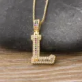 Gold tone initial L pendant necklace featuring multi-color and white cubic zirconia stones. - Letter L / Gold