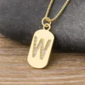 Gold initial letter W pendant necklace with sparkling cubic zirconia on box chain detail - Letter W