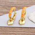 Gold orange enamel heart hoop earrings, chic metal dangle earrings for women daily wear. - Orange