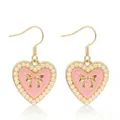 Gold drop earrings featuring a pink heart, pearl border, and a cute bow detail close-up. - Earrings / Pink