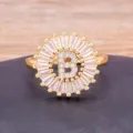 Gold plated alphabet ring with dazzling cubic zirconia baguette stones and letter B. - Letter B