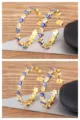 Gold plated evil eye hoop earrings with heart and star variants sparkling zirconia. - Heart / Dark Blue