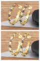 Gold plated evil eye hoop earrings with sparkling cubic zirconia, heart and star design. - Heart / Black