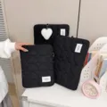 Black quilted tablet sleeve with cute heart pendant, chic minimalist storage bag for daily use. - L / Black