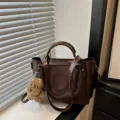 Retro textured women tote bag stylish large capacity shoulder crossbody bag with cute plush charm - With Pendant / Coffee