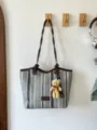 Commuter large straw woven tote bag with cute bear pendant and stylish striped design. - Style 1 (Black and White Stripes) / With Pendant / Brown