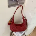 Red solid color casual commuter fashion pleated retro lazy single shoulder dumpling bag - With Pendant / Red