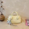 Chic yellow bowling shoulder bag with silver star charm, PU leather crossbody handbag. - With Pendant / Yellow