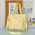 Gelbe Canvas Umhängetasche mit süßen Katzenohren und Gesicht, leichte Schultasche für Pendler - Einzelne Tasche / Gelb