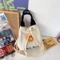 Lässige Canvas Eimer Tasche mit süßem Smiley Gesicht Druck, Retro Handtasche für Damen. - Schwarz