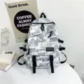 Men newspaper graffiti backpack trendy casual school bookbag with multi pockets and straps. - Bag Only (No Charm) / White