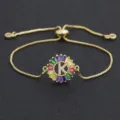 Gold plated brass slider bracelet featuring a colorful baguette zircon letter K pendant design. - Letter K