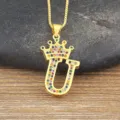 Gold-plated letter U pendant necklace featuring colorful zirconia stones and crown charm. - Letter U