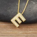 Gold-plated letter E pendant necklace with sparkling cubic zirconia micro-pave stones. - Letter E