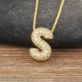 Gold letter S pendant necklace, pave cubic zirconia initial jewelry variant for women. - S